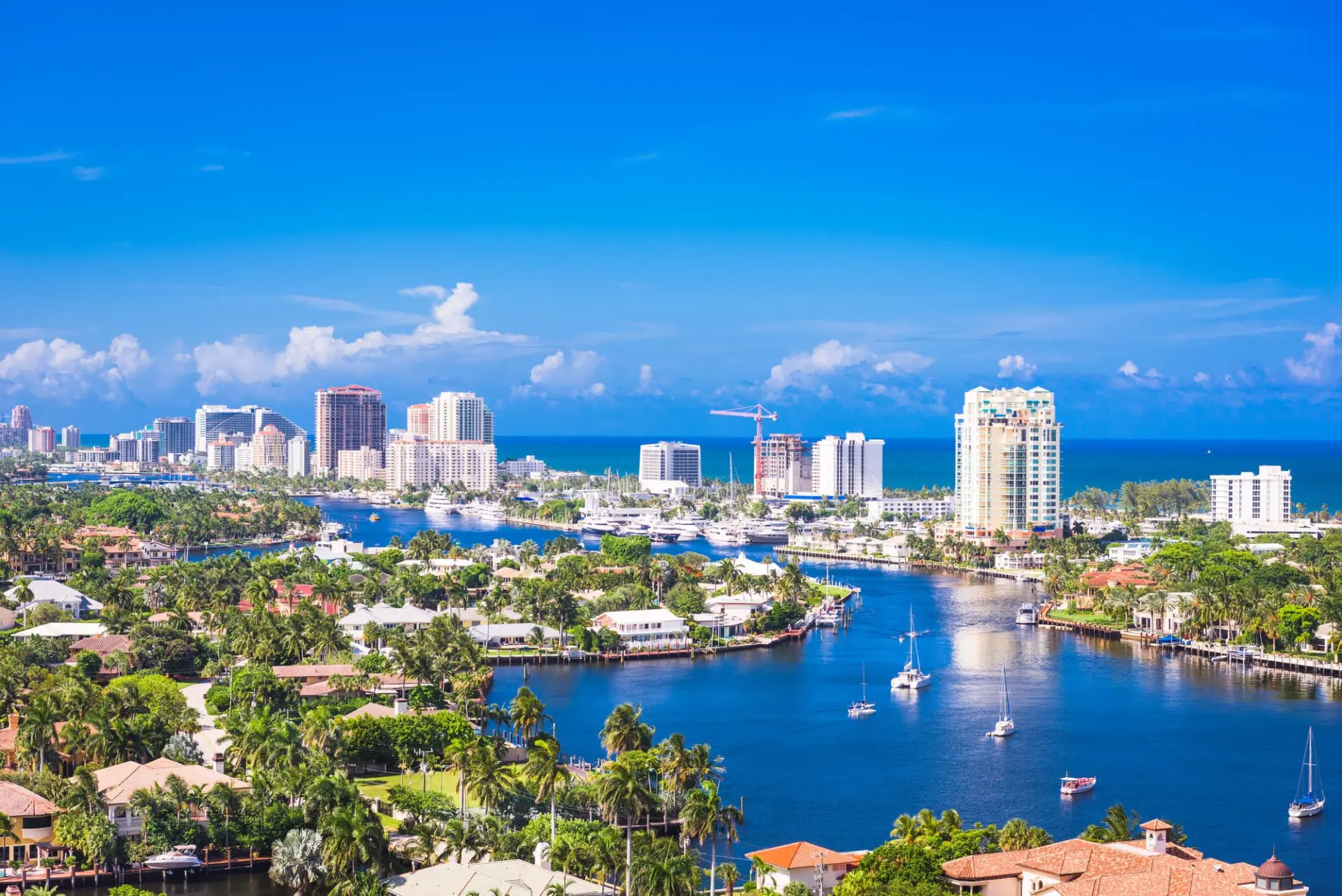 Fort Lauderdale, Florida homes for sale — Aerial view of Fort Lauderdale waterfront skyline with Intracoastal Waterway and luxury condos