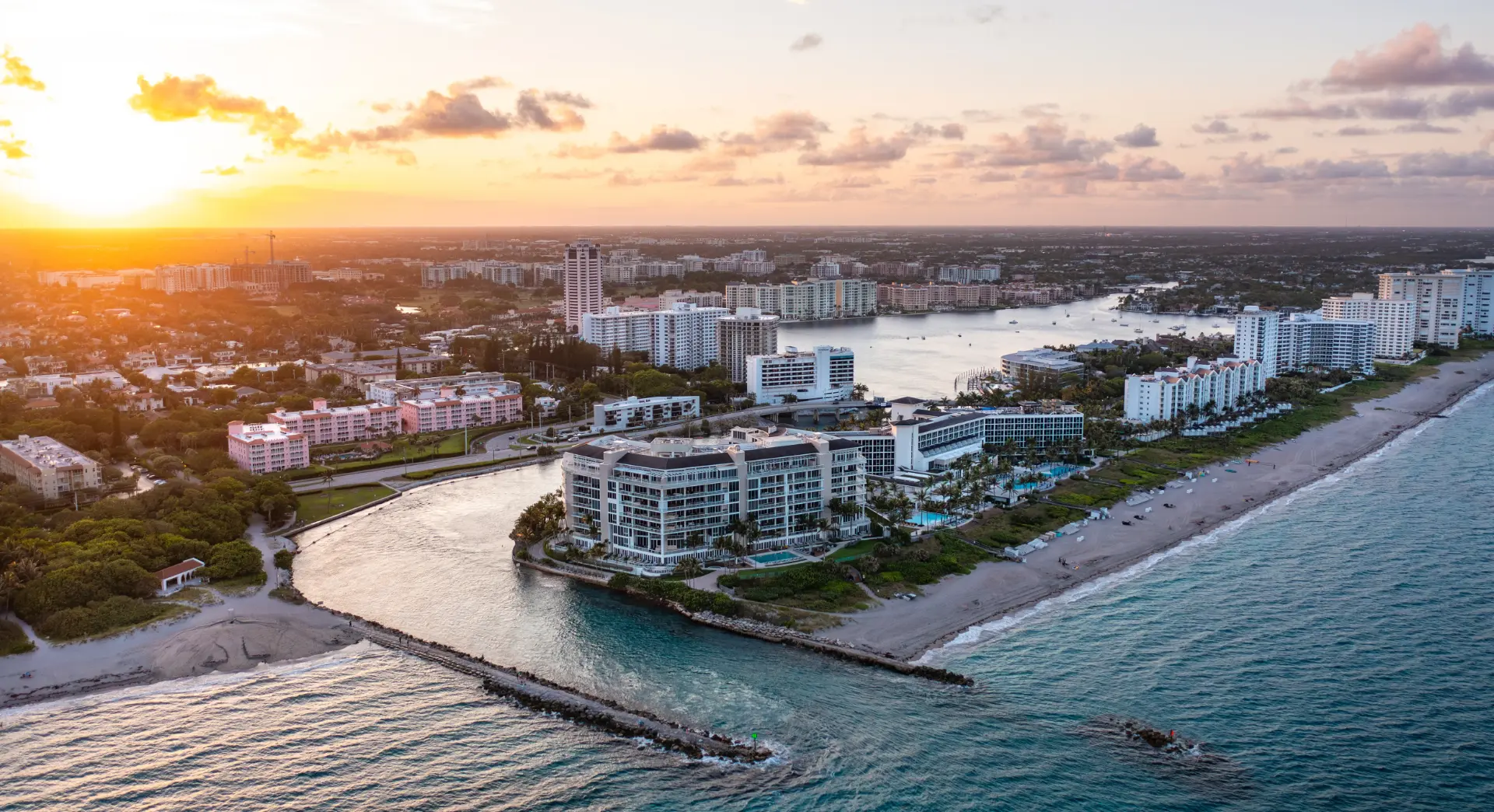 Boca Raton, Florida homes for sale — Boca Raton Florida oceanfront skyline at sunset with luxury condos and beach access